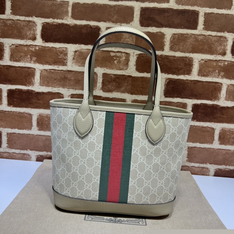 G*u*i shopping bags